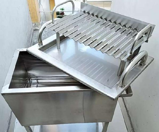 caja china y parrillas de acero inoxidable